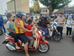 Polres Basel Bagikan 100 Kotak Takjil Gratis di Simpang Tugu Nanas